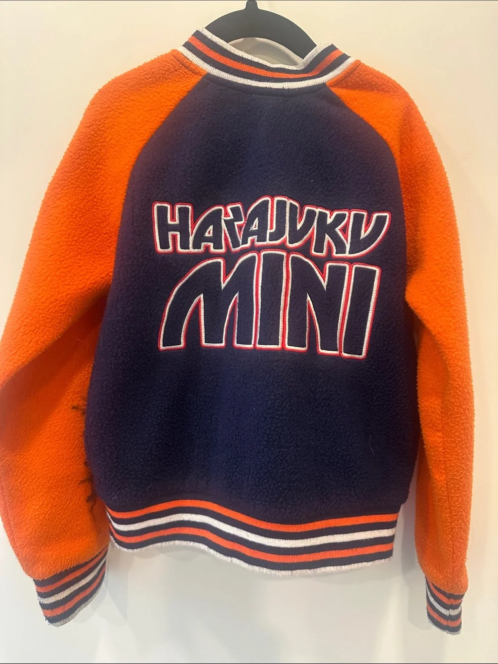 Harajuku Mini Navy and Orange Varsity Jacket with Skull Patch